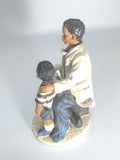 Heartfelt Healing - Vintage African American Pediatrician Statue - Examining a Standing Boy.