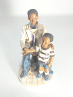 Heartfelt Healing - Vintage African American Pediatrician Statue - Examining a Standing Boy.