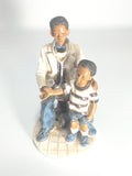 Heartfelt Healing - Vintage African American Pediatrician Statue - Examining a Standing Boy.