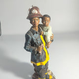 Vintage figurine - African American The Red Hat Fireman - Rescuer a Baby.