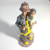 Vintage figurine - African American The Red Hat Fireman - Rescuer a Baby.