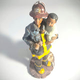 Vintage figurine - African American The Red Hat Fireman - Rescuer a Baby.