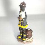 Vintage figurine - African American The Red Hat Fireman - Rescuer a Baby.