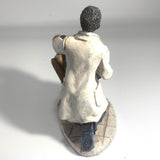 Heartfelt Healing - Vintage African American Pediatrician Statue - Examining Child Sitting